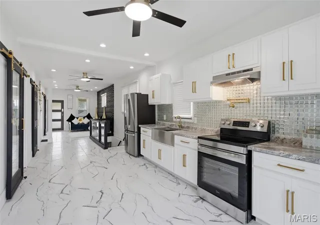 Photo 3 of Single family home for sale at 1825 Edwardsville Rd, Madison, IL 62060 | MLS# MIS26049974 | Listing updated on 2026-09-17