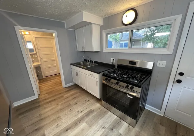 Photo 4 of Single family home for sale at 1305 S Belmont Ave, Indianapolis, IN 46221 | MLS# 22119786 | Listing updated on 2026-10-10