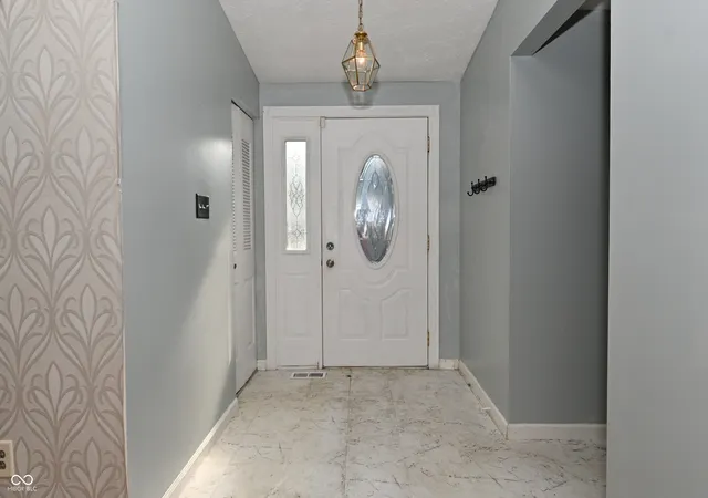 Photo 3 of Single family home for sale at 1302 Butternut Ln, Indianapolis, IN 46234 | MLS# 22122863 | Listing updated on 2026-09-23