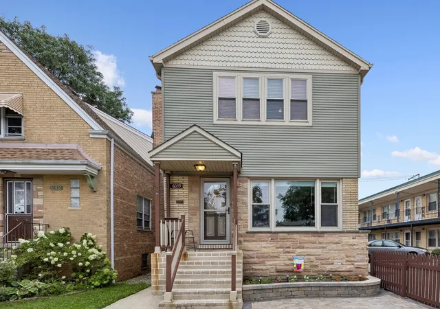 Photo 1 of Single family home for sale at 6039 W Montrose Ave, Chicago, IL 60634 | MLS# 12693442 | Listing updated on 2026-09-23