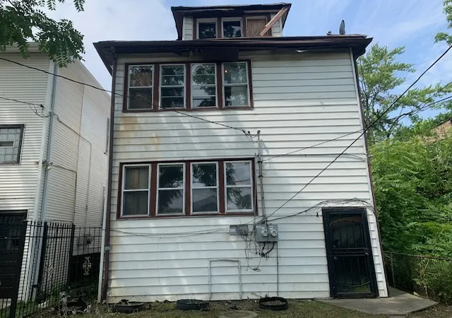 Photo 3 of Multi family home for sale at 11833 S Indiana Ave, Chicago, IL 60628 | MLS# 12714928 | Listing updated on 2026-10-08