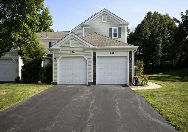 Photo 1 of Townhouse for sale at 230 University Ln, Elk Grove Village, IL 60007 | MLS# 12727064 | Listing updated on 2026-09-24