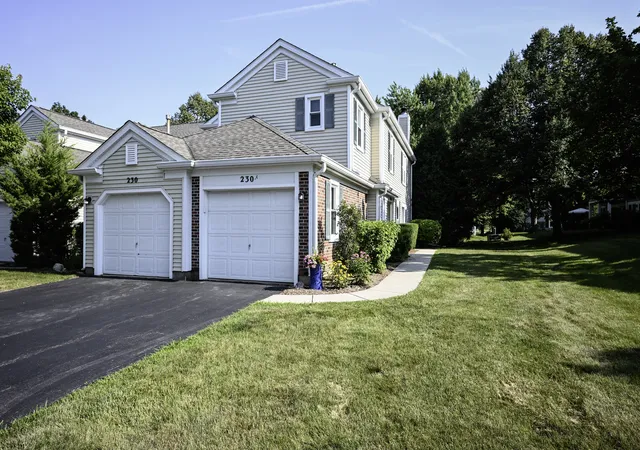 Photo 2 of Townhouse for sale at 230 University Ln, Elk Grove Village, IL 60007 | MLS# 12727064 | Listing updated on 2026-09-24