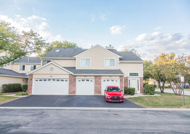 Photo 1 of Townhouse for sale at 201 Brittany Dr #A, Streamwood, IL 60107 | MLS# 12751644 | Listing updated on 2026-09-16