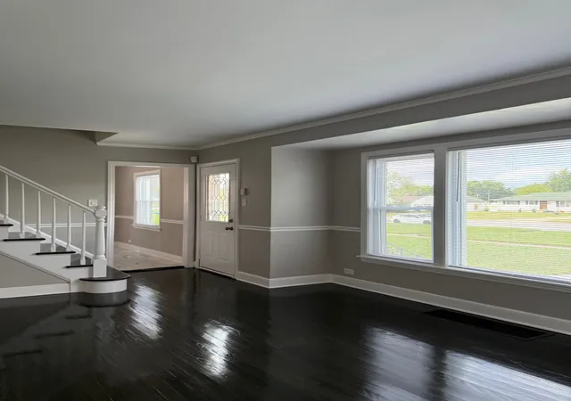 Photo 3 of Single family home for sale at 104 E 150th Street, Harvey, IL 60426 | MLS# 12763383 | Listing updated on 2026-09-24