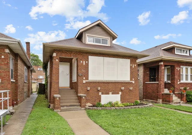 Photo 1 of Single family home for sale at 8035 S Oglesby Ave, Chicago, IL 60617 | MLS# 12763573 | Listing updated on 2026-09-25