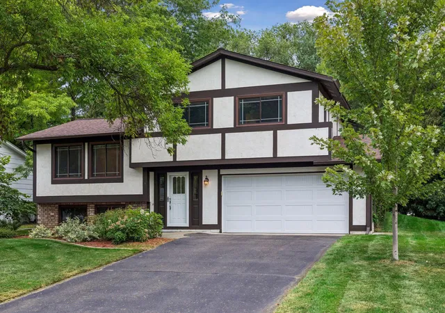 Single family home for sale at 1013 Robinhood Pl, Saint Paul, MN 55126 | MLS# 7131788