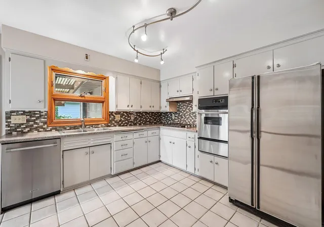 Photo 2 of Single family home for sale at 612 Russell Ave S, Minneapolis, MN 55405 | MLS# 7133873 | Listing updated on 2026-09-17