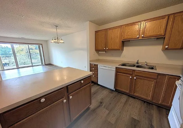 Listing Photo 1 - Condo for sale in building located at 2231 Penn Pl, North St. Paul, MN 55109 - Unit #213