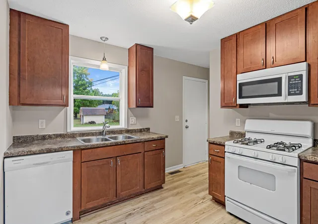 Photo 2 of Multi family home for sale at 1320 132nd Avenue Ne, Minneapolis, MN 55434 | MLS# 7145386 | Listing updated on 2026-09-18