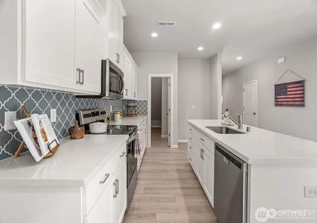 Photo 3 of Single family home for sale at 1406 60th Avenue NE, Tacoma, WA 98422 | MLS# NWM2335180 | Listing updated on 2026-09-17