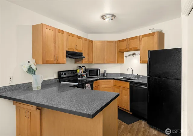 Photo 3 of Condo for sale at 1425 S Puget Dr #213, Renton, WA 98055 | MLS# NWM2351434 | Listing updated on 2026-09-17
