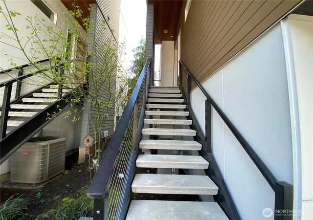 Photo 3 of Condo for sale at 213 4th Court S, Kirkland, WA 98033 | MLS# NWM2392840 | Listing updated on 2026-09-17