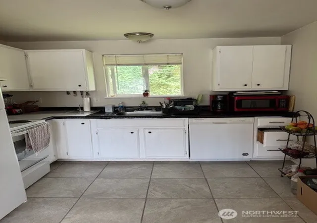 Photo 3 of Multi family home for sale at 315 W Woodworth St, Sedro Woolley, WA 98284 | MLS# NWM2416801 | Listing updated on 2026-09-17