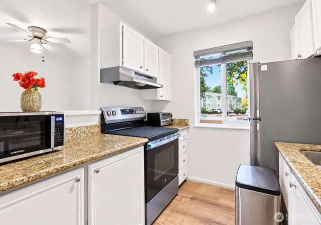 Photo 3 of Condo for sale at 12515 Ne 132nd Court #A101, Kirkland, WA 98034 | MLS# NWM2453671 | Listing updated on 2026-09-22