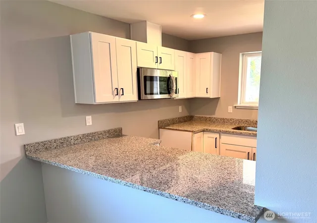 Photo 4 of Single family home for sale at 660 Itswoot Ave SE, Ocean Shores, WA 98569 | MLS# NWM2453841 | Listing updated on 2026-09-17