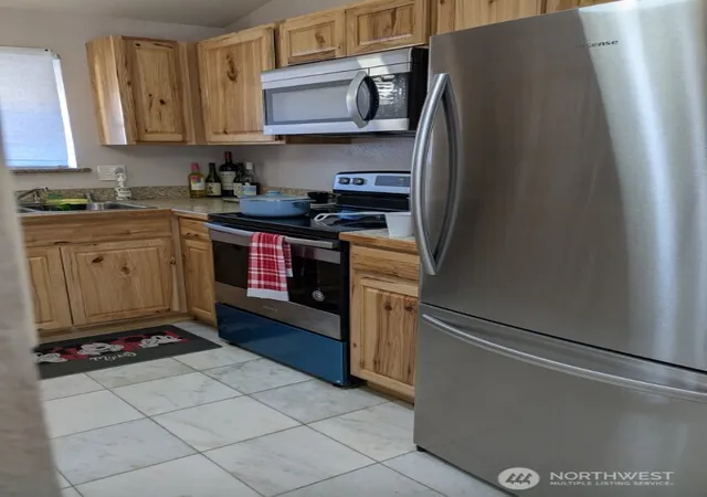 Photo 3 of Townhouse for sale at 3435 SE Auburn Way S #48, Auburn, WA 98092 | MLS# NWM2463743 | Listing updated on 2026-09-17