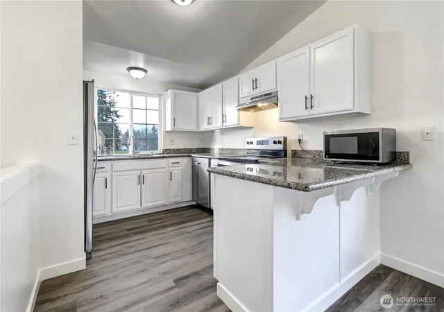 Photo 4 of Single family home for sale at 8823 18th Avenue E, Tacoma, WA 98445 | MLS# NWM2473073 | Listing updated on 2026-09-17