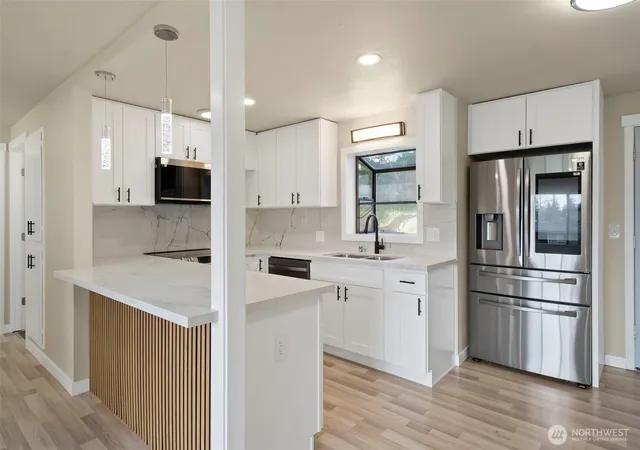 Photo 4 of Single family home for sale at 3012 SW 102nd Street, Seattle, WA 98146 | MLS# NWM2482064 | Listing updated on 2026-09-17
