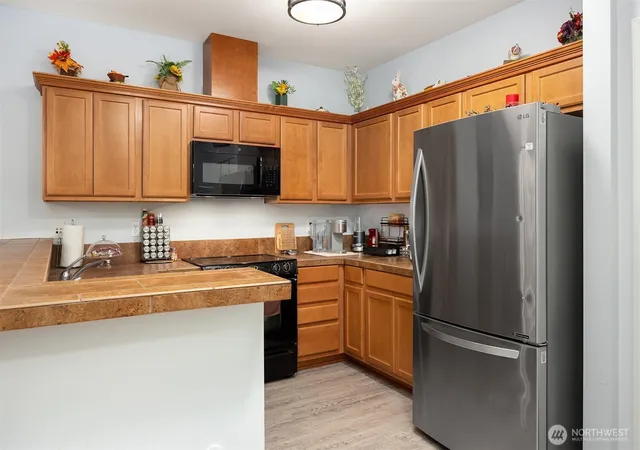 Photo 3 of Condo for sale at 1736 10th Avenue NE #C110, Issaquah, WA 98029 | MLS# NWM2491555 | Listing updated on 2026-09-30