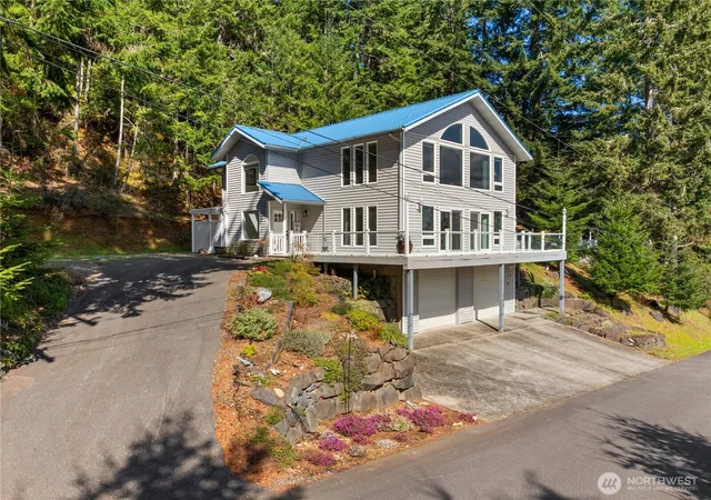 Photo 3 of Single family home for sale at 100 Ne Alta Vista Dr, Belfair, WA 98528 | MLS# NWM2497573 | Listing updated on 2026-09-24