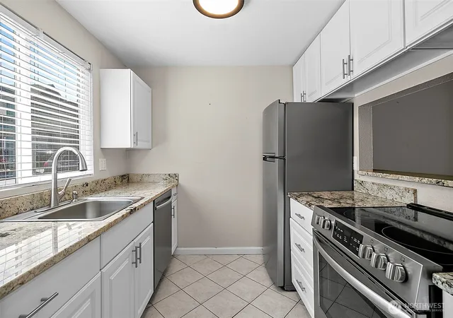 Photo 3 of Condo for sale at 1040 S 320th Street #5, Federal Way, WA 98003 | MLS# NWM2521262 | Listing updated on 2026-10-01