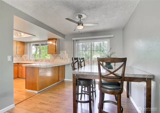 Photo 3 of Single family home for sale at 707 Alvord Ave N, Kent, WA 98031 | MLS# NWM2533558 | Listing updated on 2026-09-16