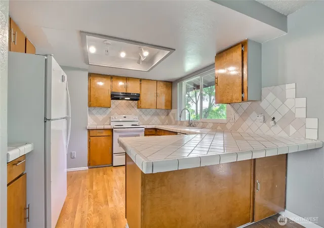 Photo 4 of Single family home for sale at 707 Alvord Ave N, Kent, WA 98031 | MLS# NWM2533558 | Listing updated on 2026-09-16