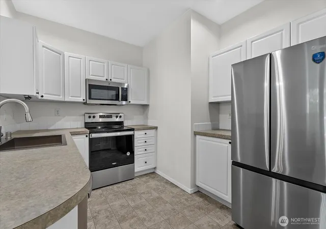 Photo 3 of Condo for sale at 12712 Admiralty Way #G304, Everett, WA 98204 | MLS# NWM2542164 | Listing updated on 2026-09-24