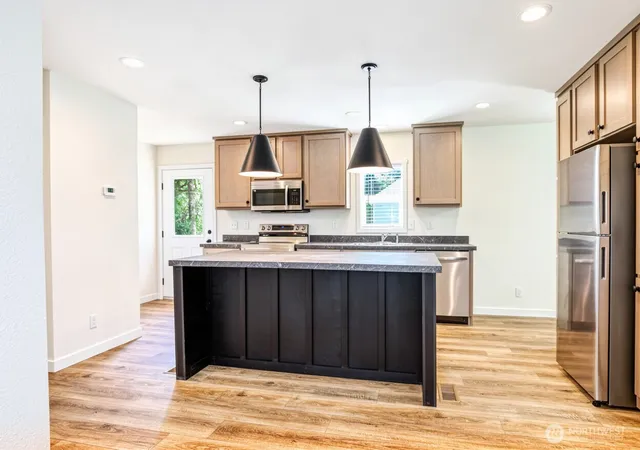 Photo 3 of Manufactured home for sale at 227 Sunrise Ave SE, Ocean Shores, WA 98569 | MLS# NWM2566872 | Listing updated on 2026-09-16