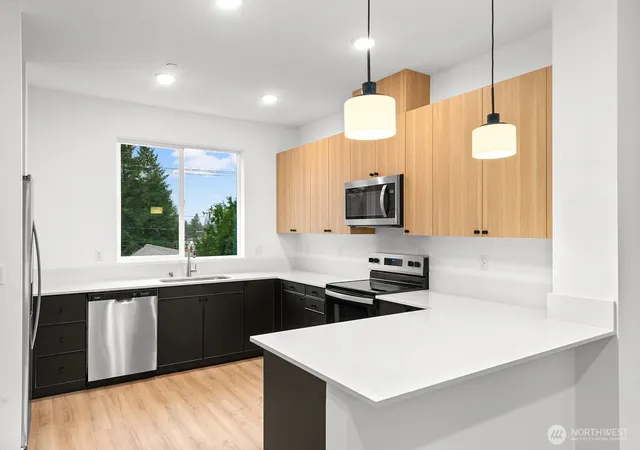 Photo 3 of Townhouse for sale at 1411 SW 111th Lane, Seattle, WA 98146 | MLS# NWM2570245 | Listing updated on 2026-09-25