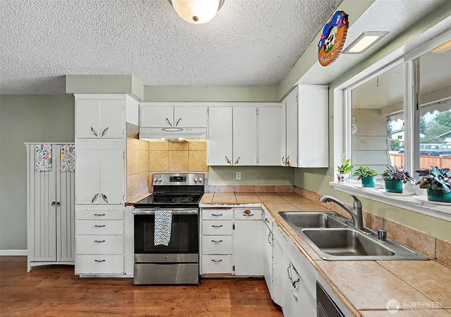 Photo 3 of Single family home for sale at 8718 107th St E, Puyallup, WA 98373 | MLS# NWM2574640 | Listing updated on 2026-10-01