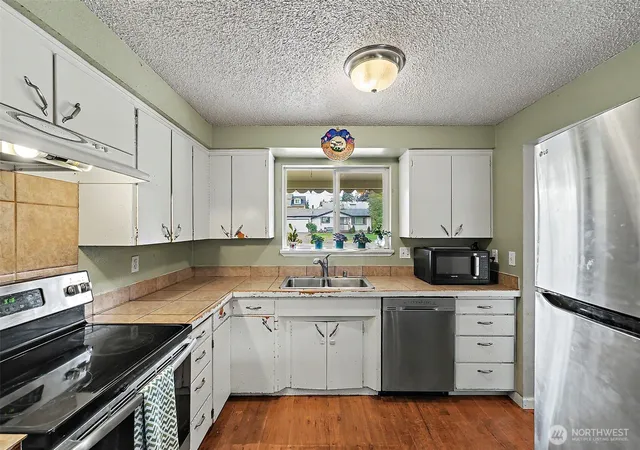 Photo 3 of Single family home for sale at 8718 107Th St E, Puyallup, WA 98373 | MLS# NWM2574640 | Listing updated on 2026-10-01