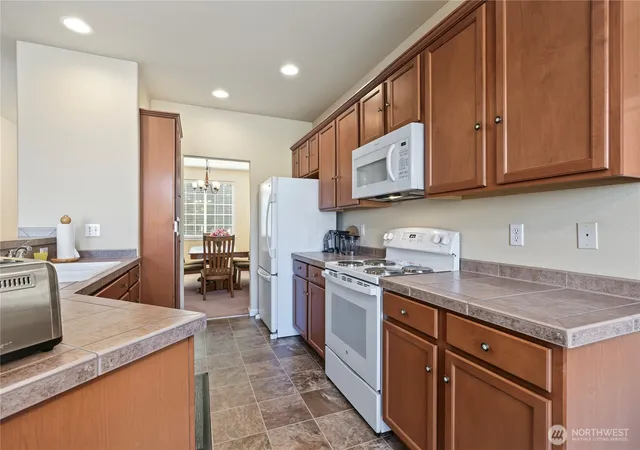 Photo 3 of Single family home for sale at 409 Balmer St SW, Orting, WA 98360 | MLS# NWM2584549 | Listing updated on 2026-09-22