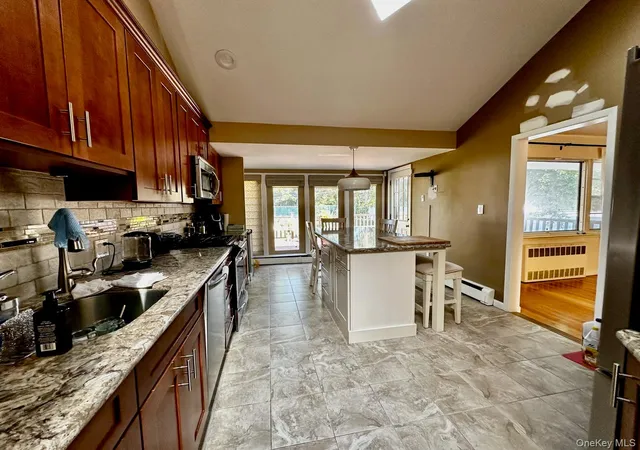 Photo 4 of Single family home for sale at 26 Canterbury Rd, Woodbury, NY 11797 | MLS# 942967 | Listing updated on 2026-09-18