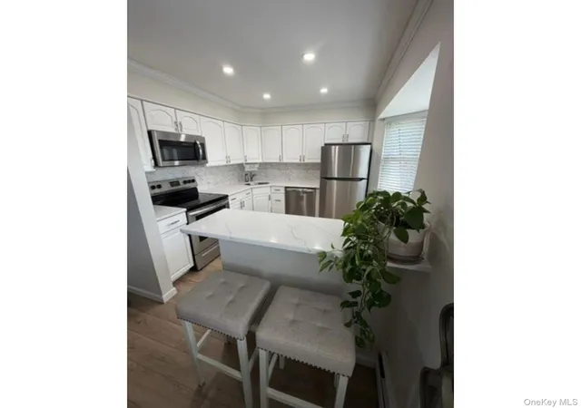 Photo 3 of Sale Pending at 104 Millard Ave #104, Babylon, NY 11704 | MLS# 1009769 | Listing updated on 2026-09-18