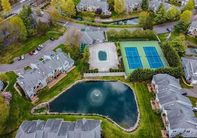 Photo 2 of Condo for sale at 38 Lakebridge Dr S, Smithtown, NY 11754 | MLS# 1010712 | Listing updated on 2026-09-18
