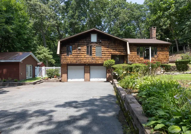 Photo 3 of Single family home for sale at 149 Cuba Hl Rd, Huntington, NY 11743 | MLS# 1019603 | Listing updated on 2026-09-30