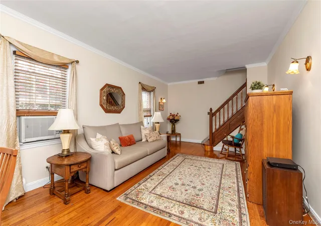 Photo 2 of Sale Pending at 215 36 48th Avenue, New York, NY 11364 | MLS# 1033799 | Listing updated on 2026-09-22