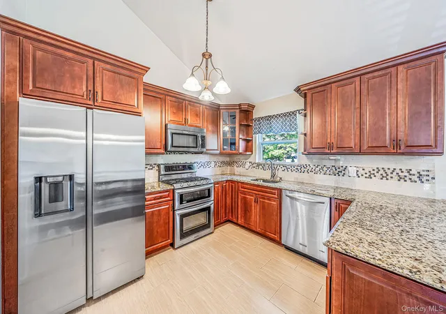 Photo 3 of Sale Pending at 20 Nicole Ln, Brookhaven, NY 11727 | MLS# 1034025 | Listing updated on 2026-09-18