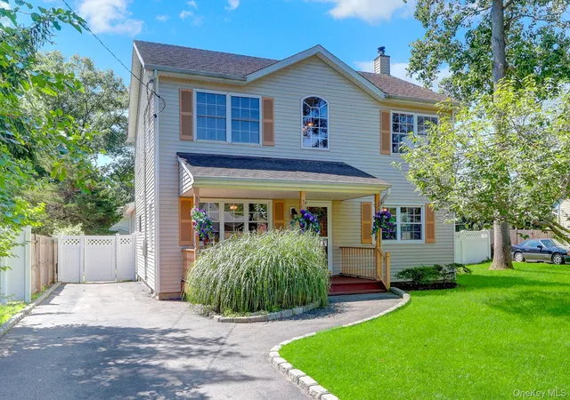 Photo 2 of Sale Pending at 18 Aster Ave, Brookhaven, NY 11742 | MLS# 1037793 | Listing updated on 2026-09-17