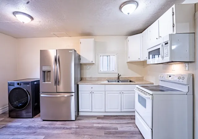 Photo 3 of Single family home for sale at 614 E Gordon Ave, Spokane, WA 99207 | MLS# 202624412 | Listing updated on 2026-09-24