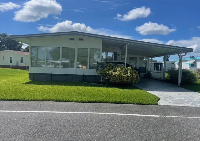 Photo 1 of Manufactured home for sale at 408 Hawthorne Blvd, Leesburg, FL 34748 | MLS# R4908835 | Listing updated on 2026-10-14