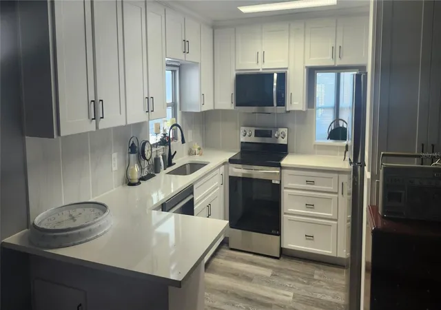 Photo 2 of Manufactured home for sale at 3702 Tiki Dr, Holiday, FL 34691 | MLS# W7878267 | Listing updated on 2026-09-18