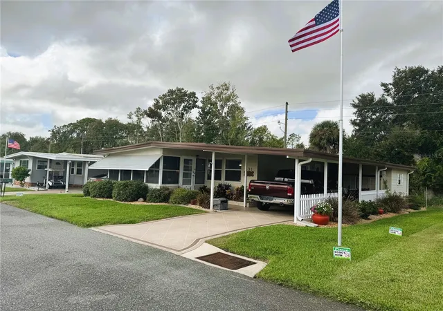 Photo 3 of Manufactured home for sale at 131 Bougainvillea Dr, Leesburg, FL 34748 | MLS# R4910055 | Listing updated on 2026-09-16
