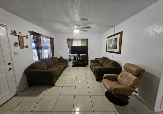 Photo 3 of Single family home for sale at 3902 Castell Dr, Orlando, FL 32810 | MLS# O6355444 | Listing updated on 2026-09-08