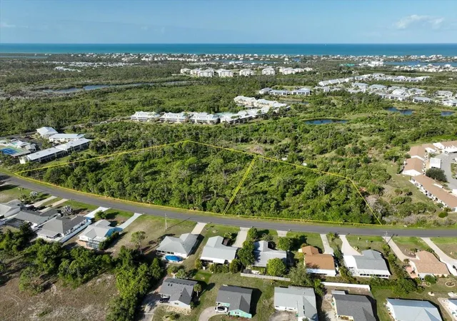 Photo 1 of Land for sale at 6700-6730 Gasparilla Pines Blvd, Englewood, FL 34224 | MLS# D6144859 | Listing updated on 2026-10-24