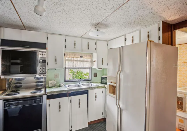Photo 2 of Manufactured home for sale at 9310 Kiowa Dr, New Port Richey, FL 34654 | MLS# W7881047 | Listing updated on 2026-10-21
