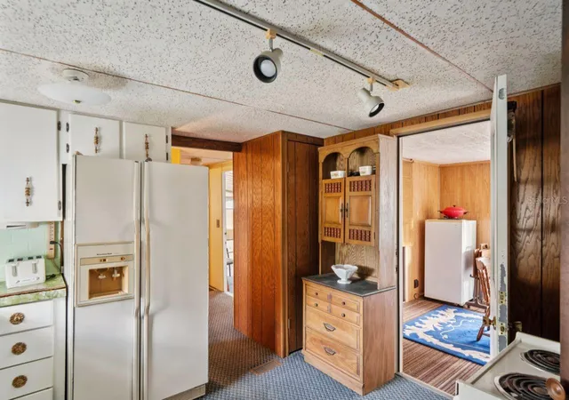 Photo 3 of Manufactured home for sale at 9310 Kiowa Dr, New Port Richey, FL 34654 | MLS# W7881047 | Listing updated on 2026-10-21