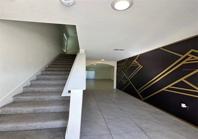 Photo 3 of Single family home for sale at 5703 Hollingworth Trl, Wesley Chapel, FL 33545 | MLS# TB8473410 | Listing updated on 2026-10-09